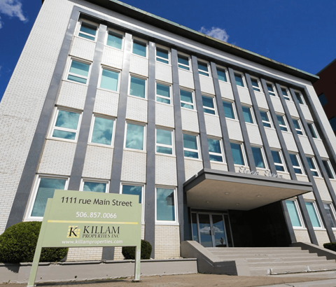 A building with a sign that says Killam Properties.