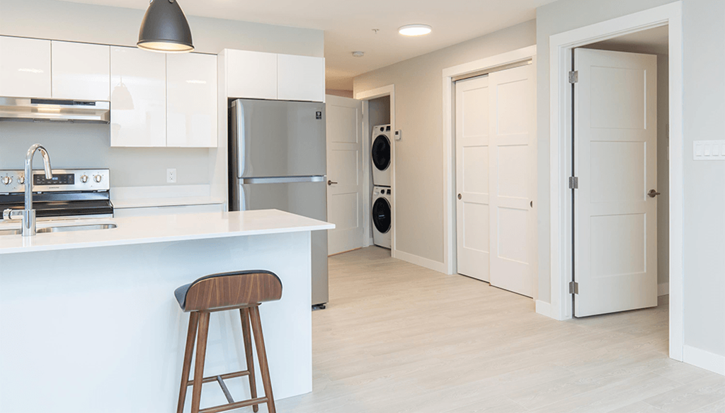 Crown Isle Boulevard Kitchen &  Living Space WIth Insuite Laundry