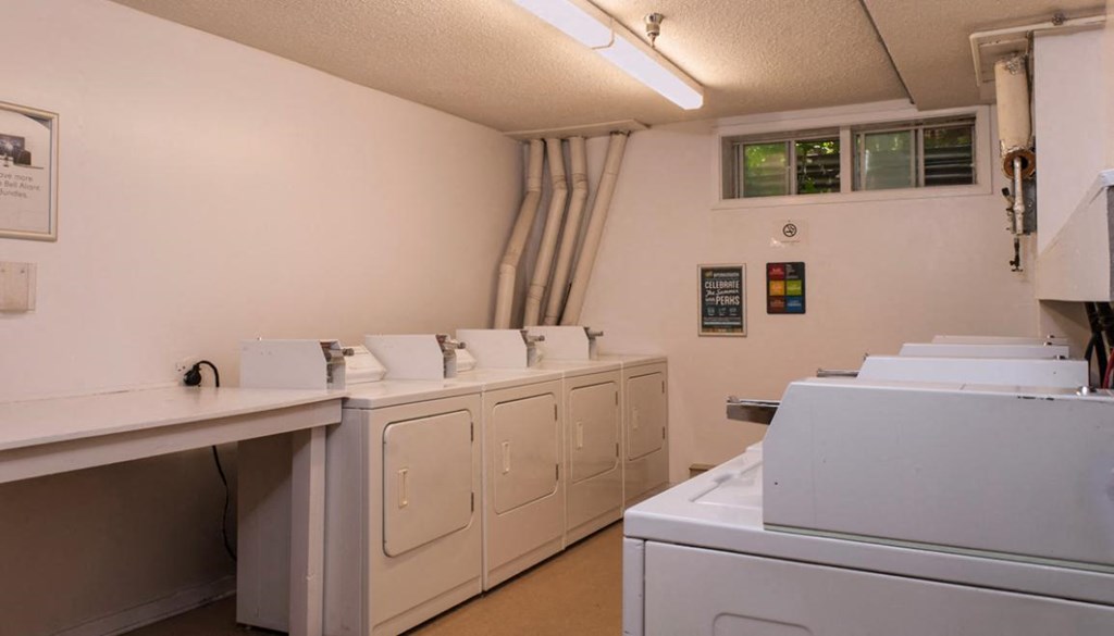 the laundry room is equipped with washes and dryers