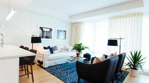 a living room with a couch and a table