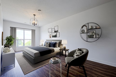 a bedroom with a bed and a chair and a window