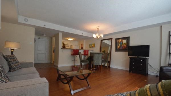 a living room with a couch and a table