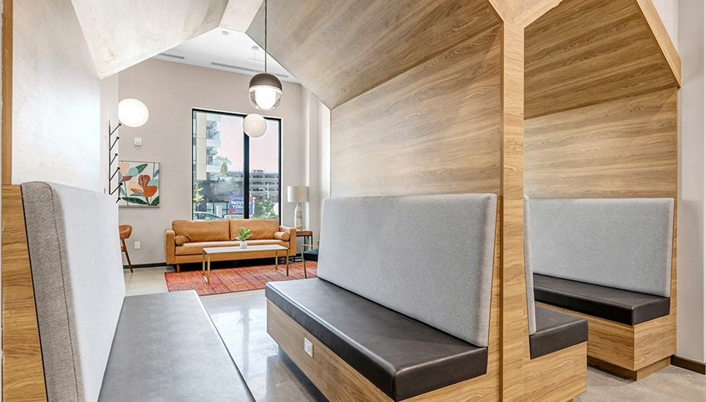 a living room with a couch and a table