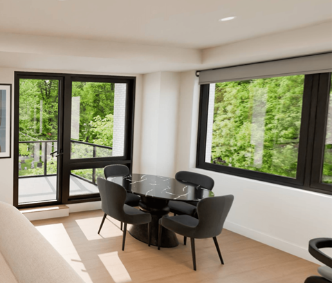 A modern dining room with a glass table and chairs.