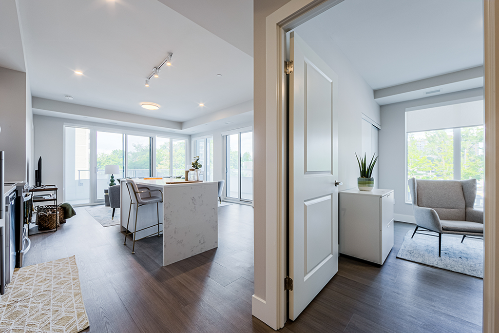 The Kay Living Room With Access to Second Bedroom