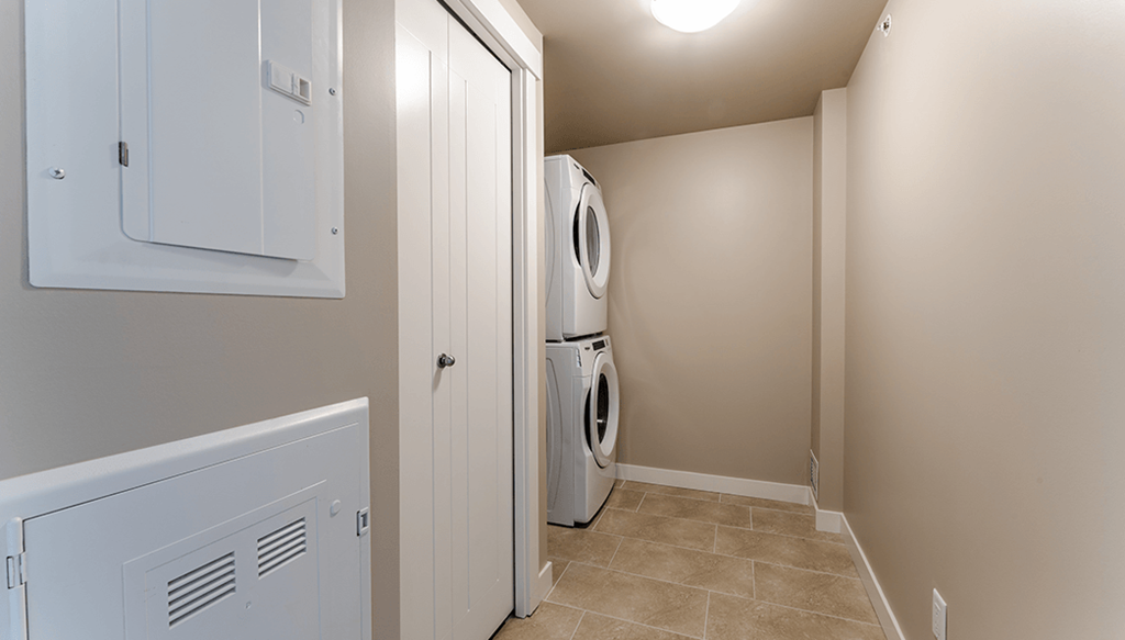 A laundry room with a washer and dryer.