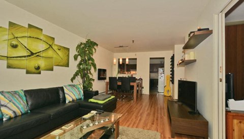 a living room with a couch and a table