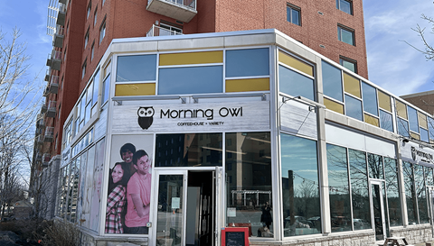 a building with a sign on the front of it