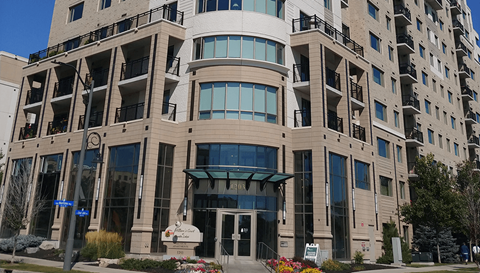 a large building with a street in front of it