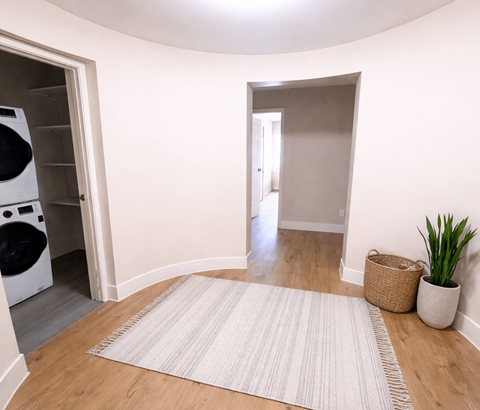 A laundry room with a washer and dryer in it.