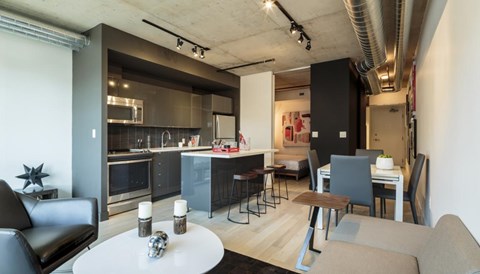 a kitchen and living room in a small apartment