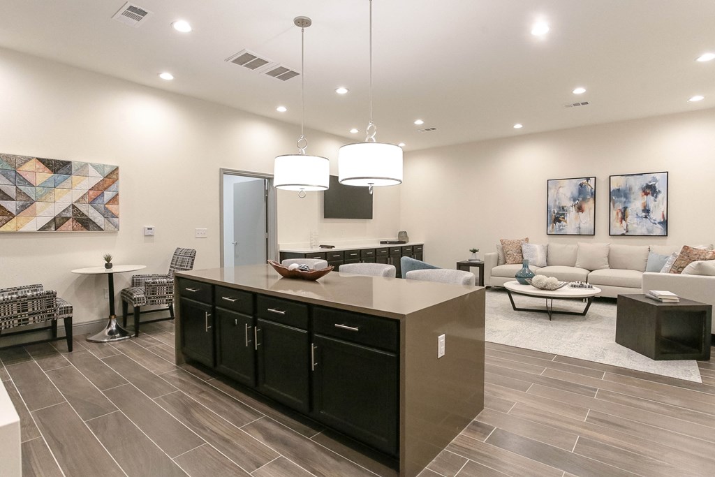 the estates at tanglewood|clubhouse kitchen and living room