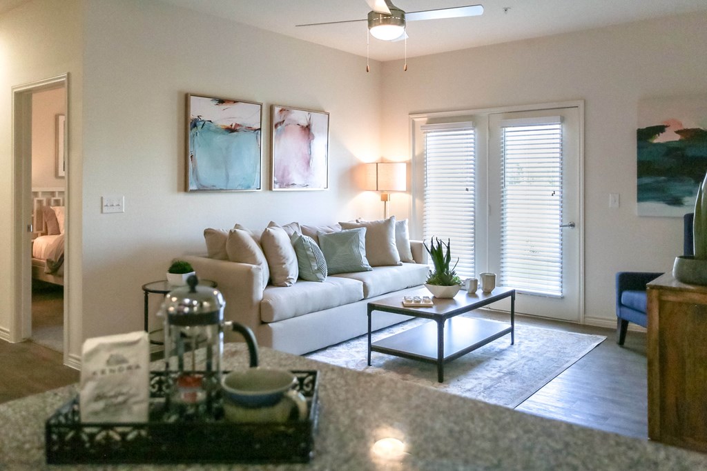 a living room with a couch and coffee table