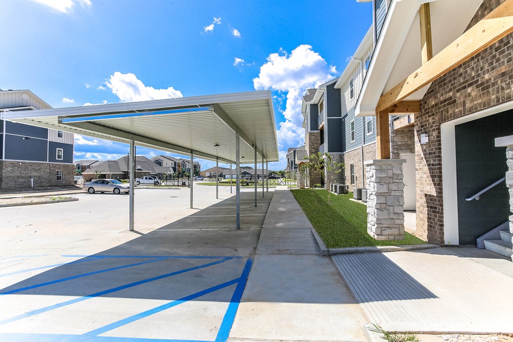 awnings at the enclave at woodbridge apartments in sugar land, tx