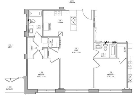 A floor plan of a house with a kitchen, living room, and two bathrooms.