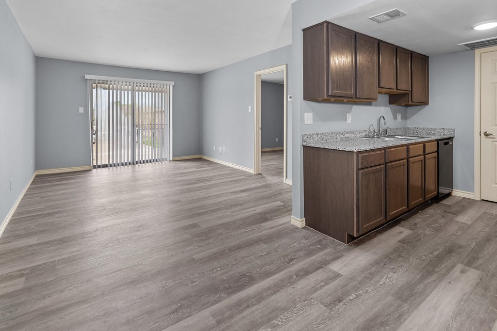 a kitchen and living room in a coronado home