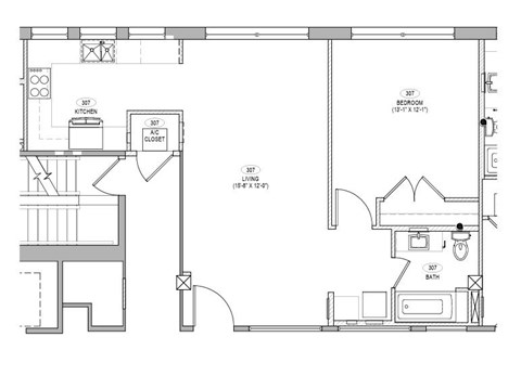 A floor plan of a house with a kitchen, living room, and bathroom.