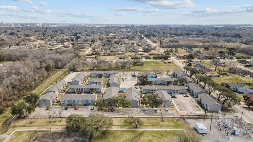 an aerial view of a neighborhood of houses in a city