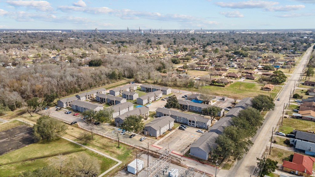 an aerial view of a cluster of houses in a city