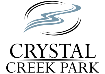 The image is a logo for Crystal Creek Park.