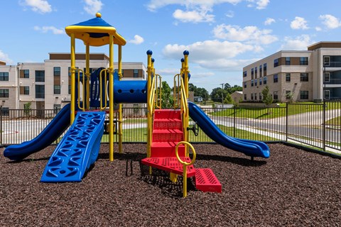 our apartments have a playground with slides and other toys