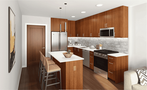A kitchen with wooden cabinets and a white island.