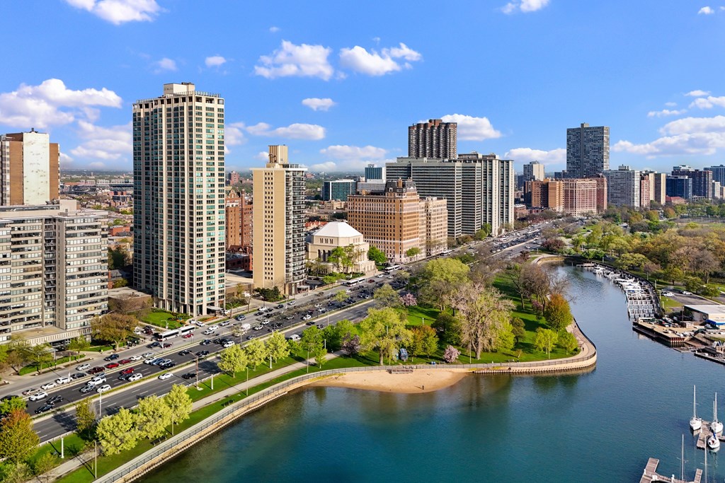 A cityscape with a river running through it.