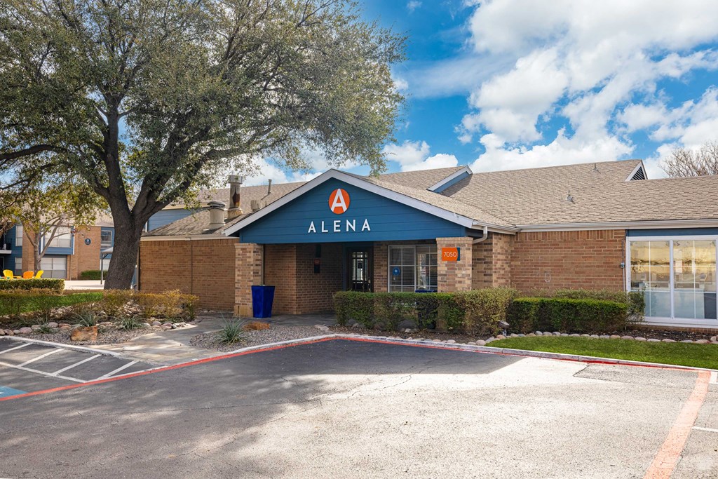 The front of a building with the word "ALENA" on it.