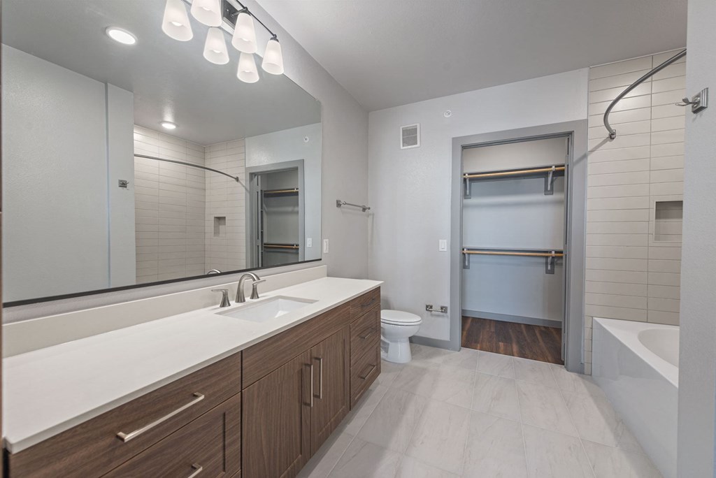 a bathroom with a large mirror