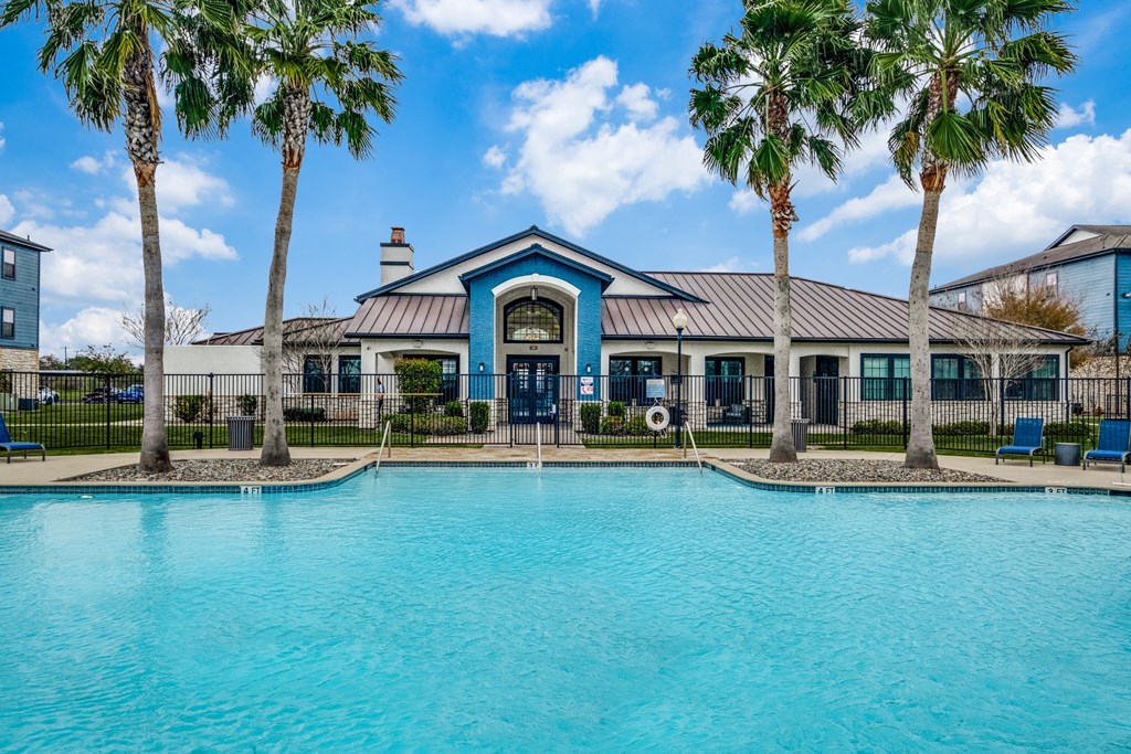 the swimming pool at the preserve at ballantyne commons apartments  at Valor at Harlingen, Texas, 78552