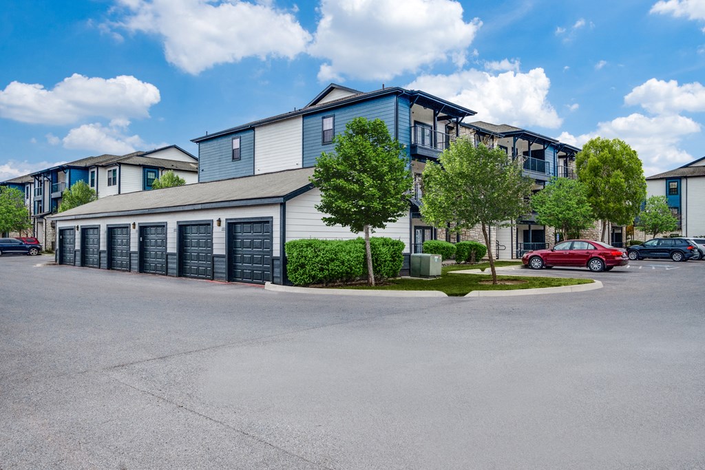 an empty parking lot in front of an apartment building  at Valor at Harlingen, Harlingen, TX, 78552