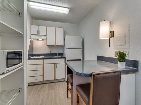 a kitchen with a counter top and a sink  at Waterford Studios, Texas, 78758