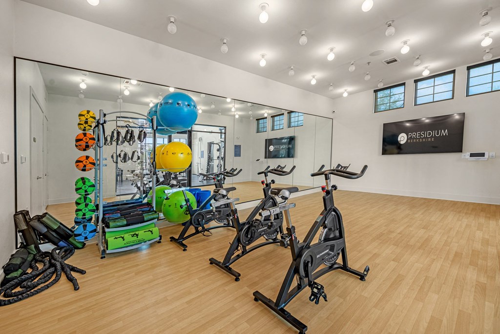 a room filled with lots of exercise equipment