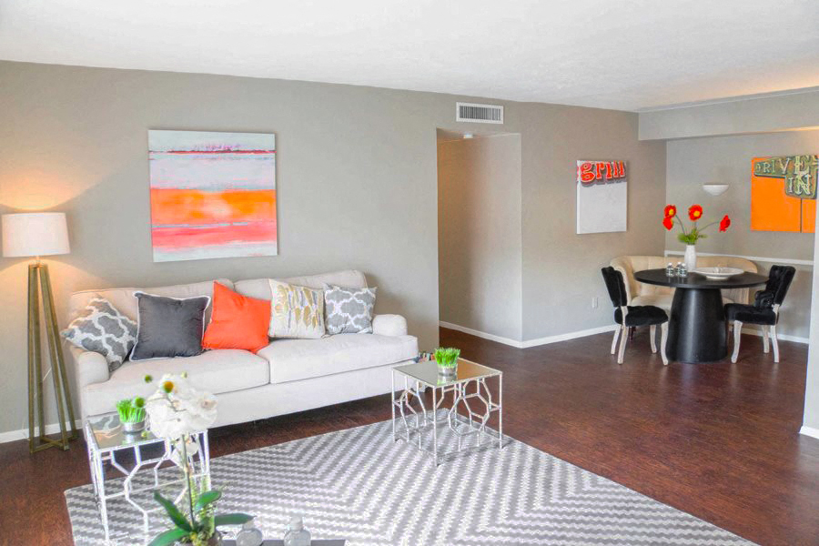 a living room with a couch and a table