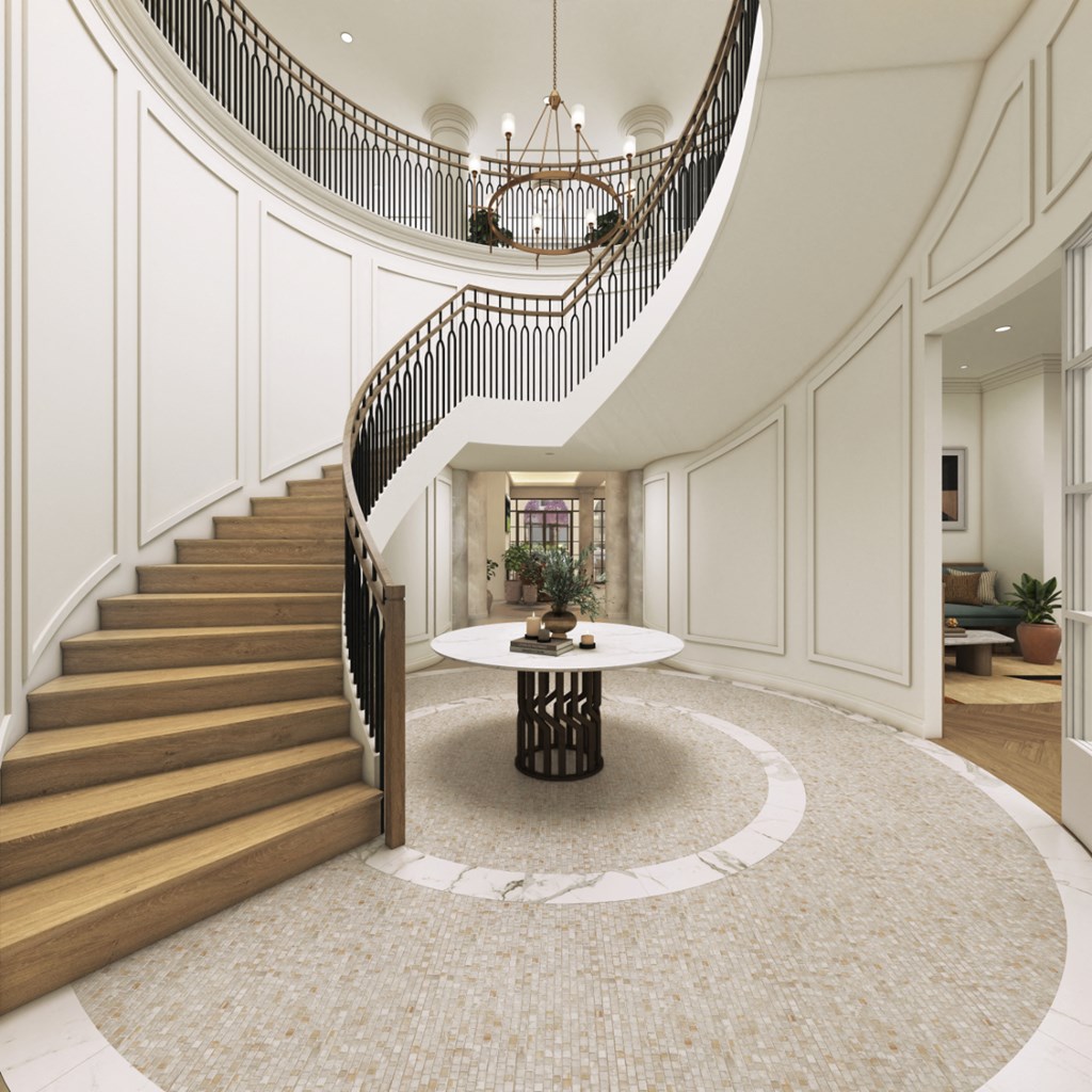 a spiral staircase with a white table in the middle of a house