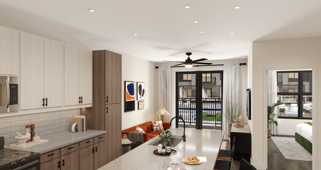 A modern kitchen with a dining area and a balcony.