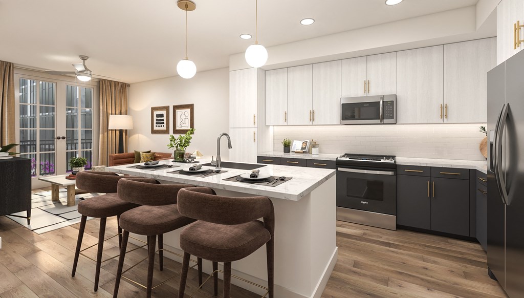 a kitchen and living room with an island and stools