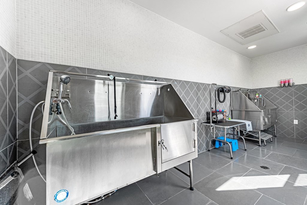 a large stainless steel sink in a kitchen  at Presidium Revelstoke, Fort Worth, Texas