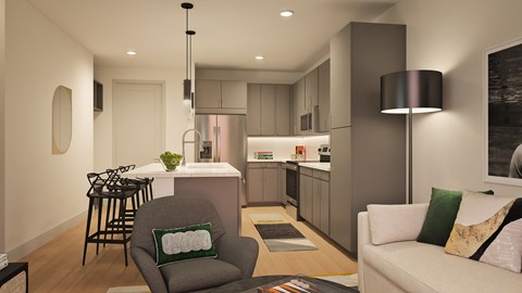 A modern living room with a grey armchair and a white sofa.