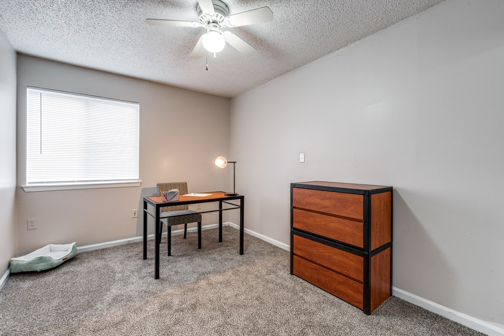 an office with a desk and a chair and a window at Vibe on Riverside, Austin, TX, 78741