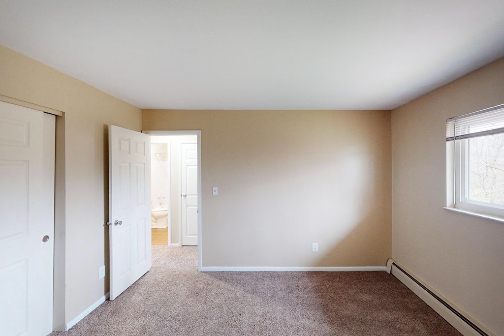 Bedroom with window light at Sharondale Woods Apartments, Cincinnati, 45241