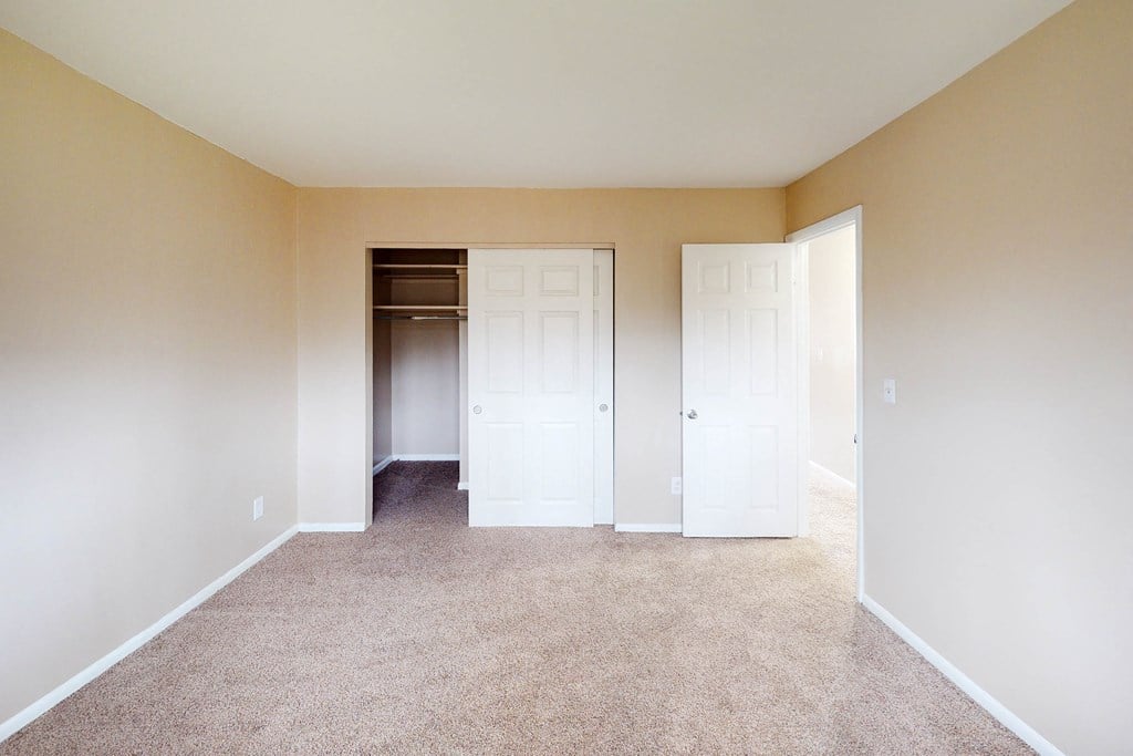 Bedroom with closet at Sharondale Woods Apartments, Cincinnati