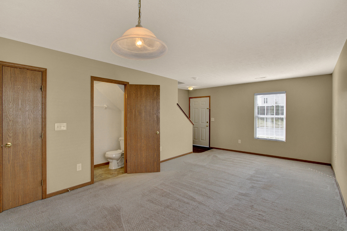 Living Room and Half Bath at Brookfield Village Apartments, Grove City