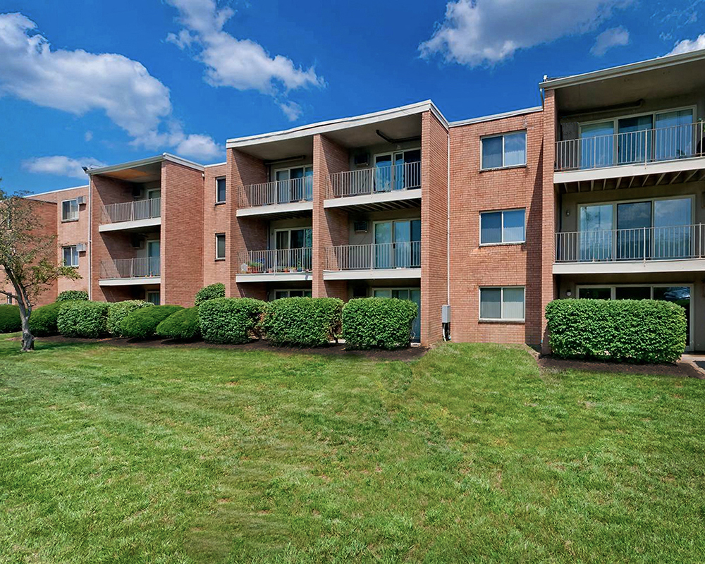 Building surrounded by greenery at Crown Pointe Apartments, Kentucky