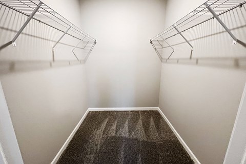 a spacious room with two closets and a carpeted floor  at Brookfield Village Apartments, Ohio