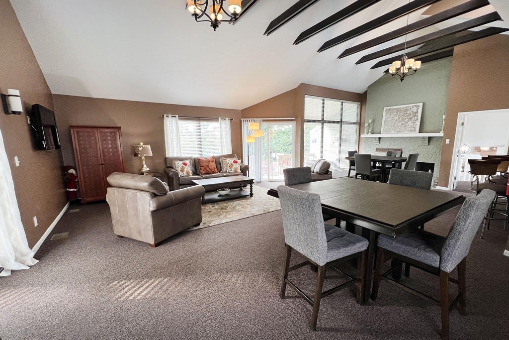 a large living room with a dining table and a couch  at Hunter's Creek Apartments, Cincinnati, OH