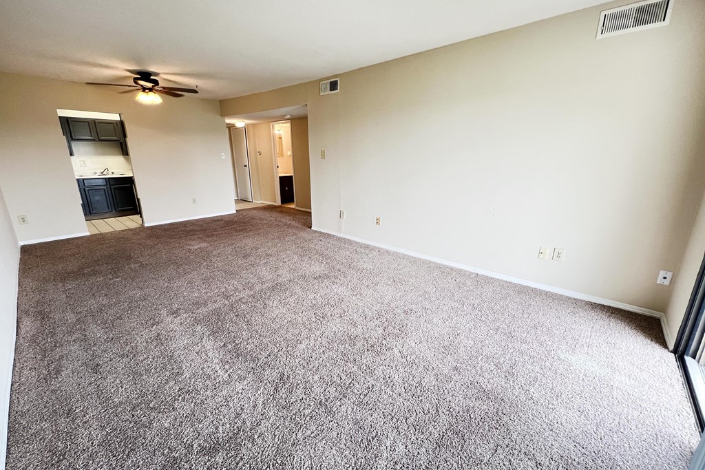 empty living room with carpet at Indian Lookout Apartments, Cincinnati, OH