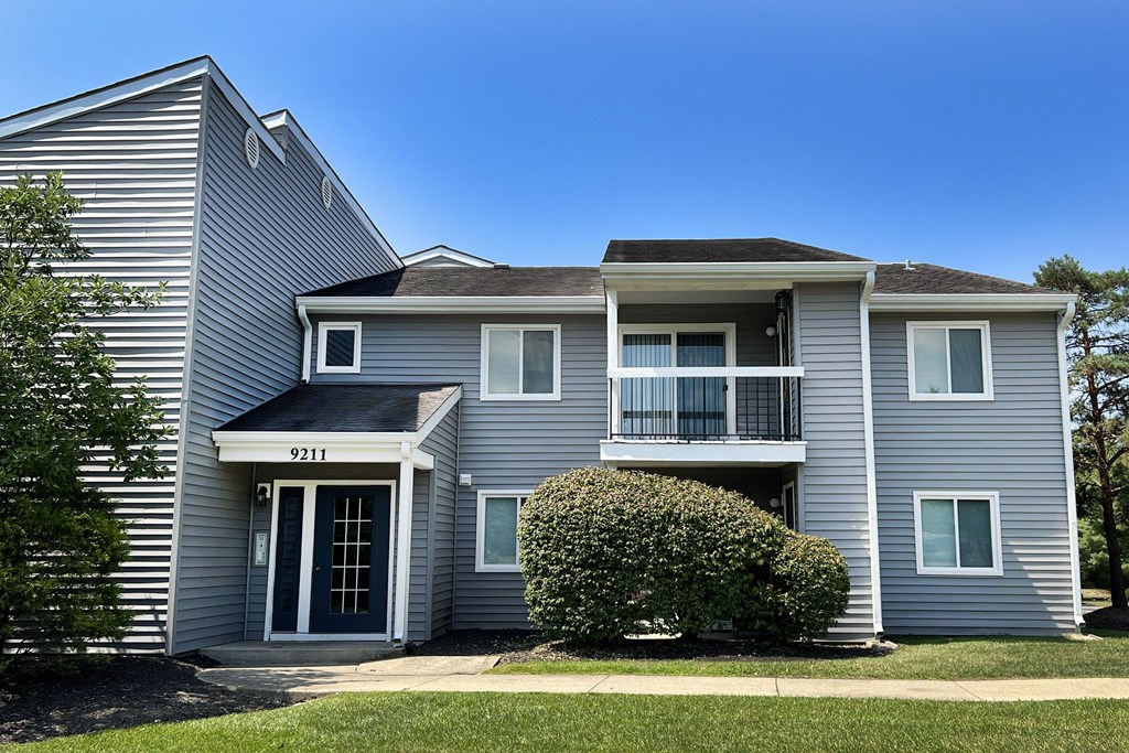 a building with a sign on the side of it that says yoyooming at Deercross Apartments, Cincinnati, OH 45236