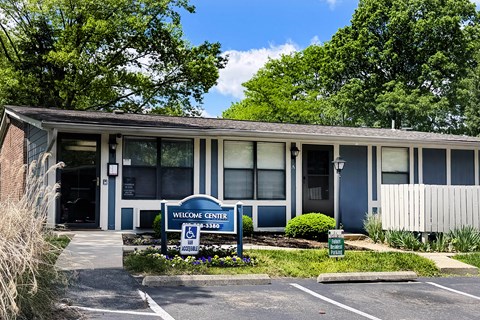 A building with a sign that says Welcome Center.