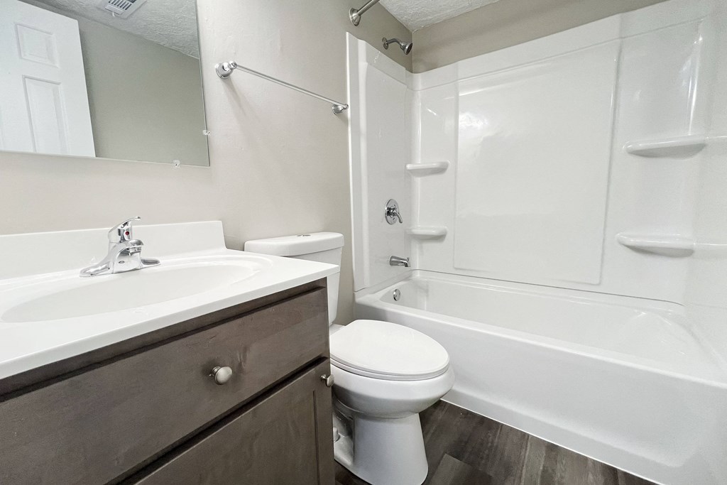 the preserve at ballantyne commons apartment bathroom with tub sink and toilet at Revere Village Apartments, Centerville, Ohio